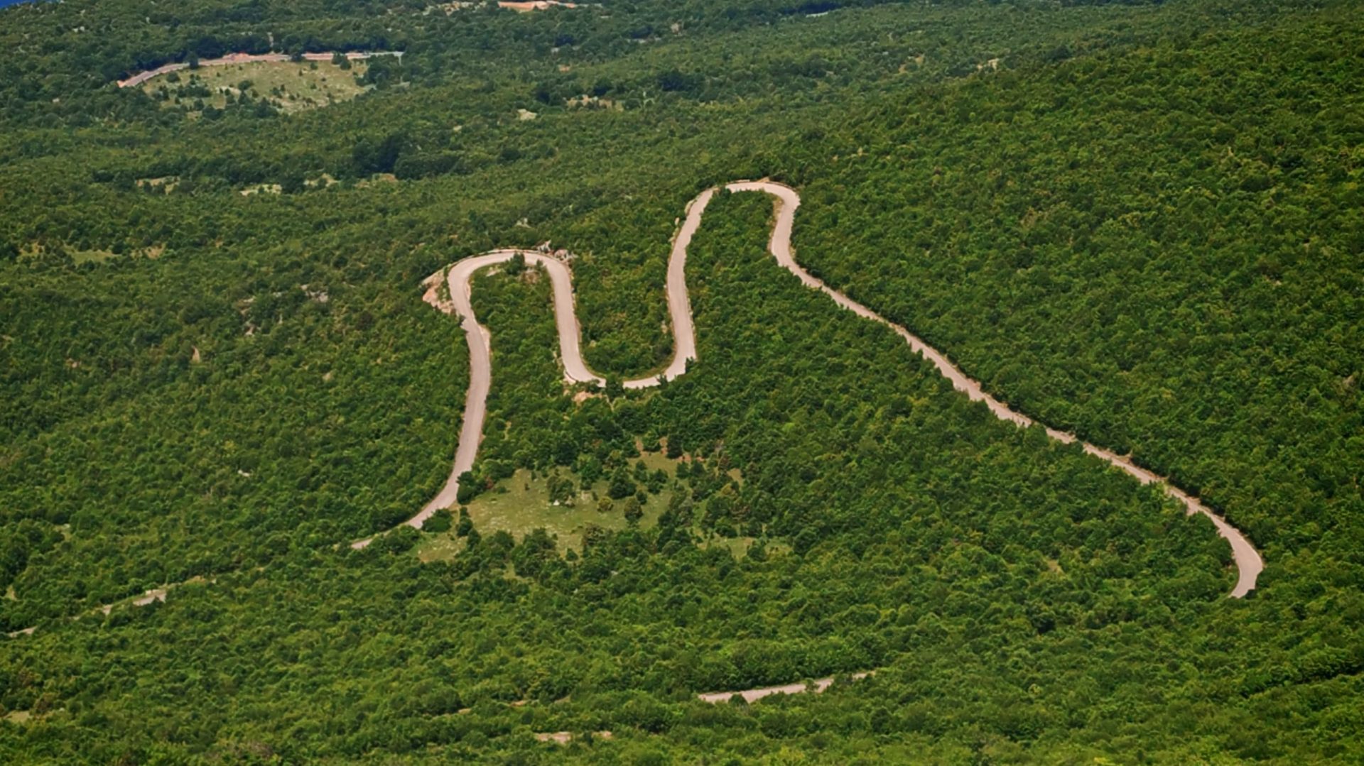 Endless curves on well paved roads